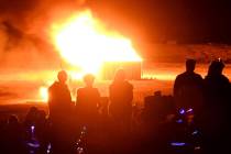 Richard Stephens/Special to the Pahrump Valley Times Burning Man attendees watch burning of str ...