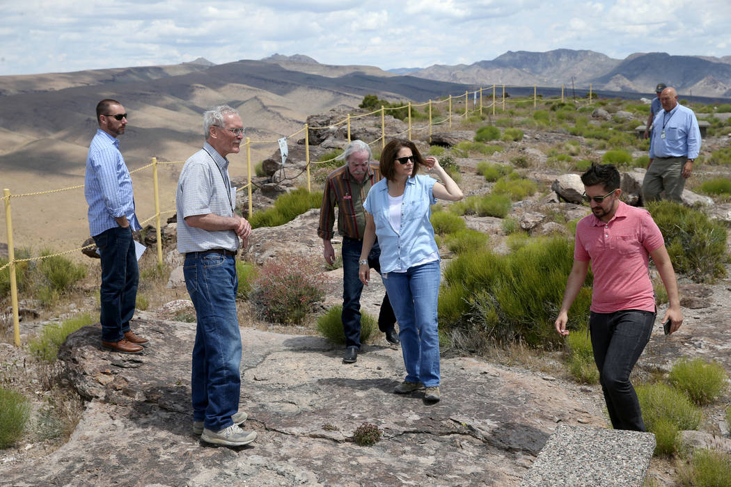 U.S. Sen. Catherine Cortez Masto, D-Nev., gets a tour on a high ridge line on Yucca Mountain 90 ...