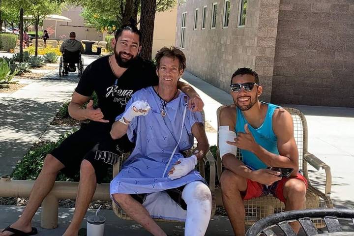 Special to the Pahrump Valley Times Mark Bolyea of Salt Lake City, Utah (center) was severely b ...