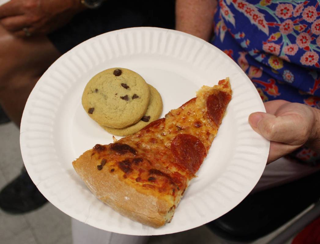 Robin Hebrock/Pahrump Valley Times Pizza and cookies helped keep hunger at bay during the town ...
