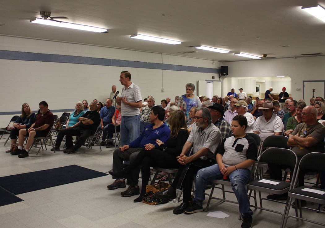 Robin Hebrock/Pahrump Valley Times Area residents are shown posing questions to Nye County Comm ...