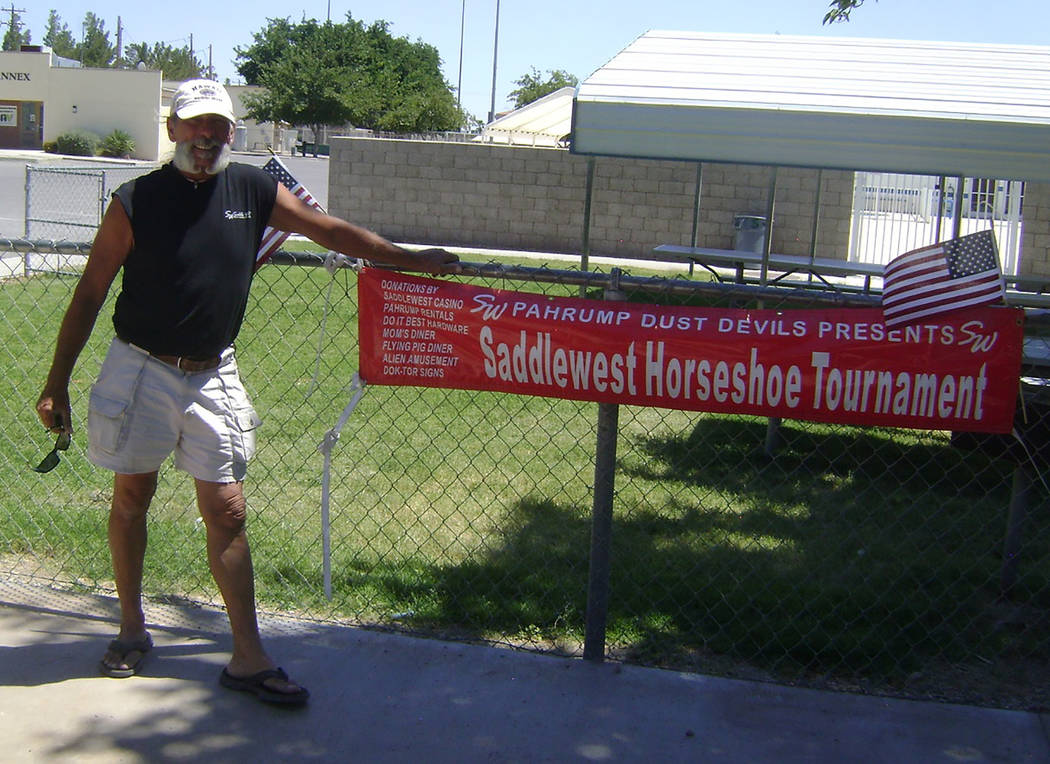Mike Norton/Special to the Pahrump Valley Times Dok Hembree of Pahrump poses with the sign he m ...