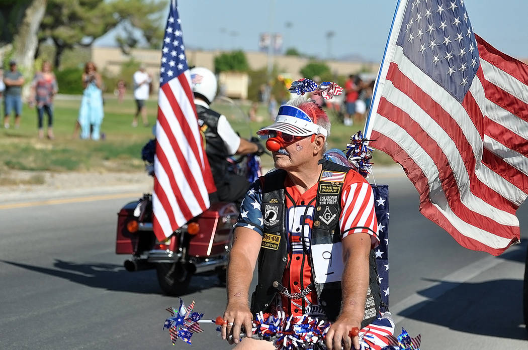 Horace Langford Jr./Pahrump Valley Times A parade entrant shows his patriotism as he rode his ...