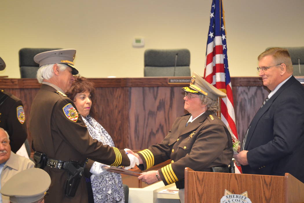 Lillian Browne/Pahrump Valley Times file This 2015 photo shows, Sheriff Sharon Wehrly shakes ha ...