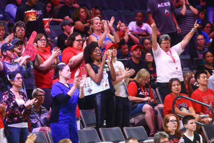 Chase Stevens/Las Vegas Review-Journal Las Vegas Aces fans cheer during the second half of a WN ...