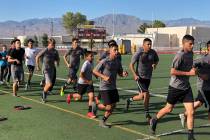 Tom Rysinski/Pahrump Valley Times Pahrump Valley High School boys soccer players run laps durin ...