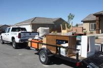 Robin Hebrock/Pahrump Valley Times A trailer loaded with home items and personal effects sits i ...