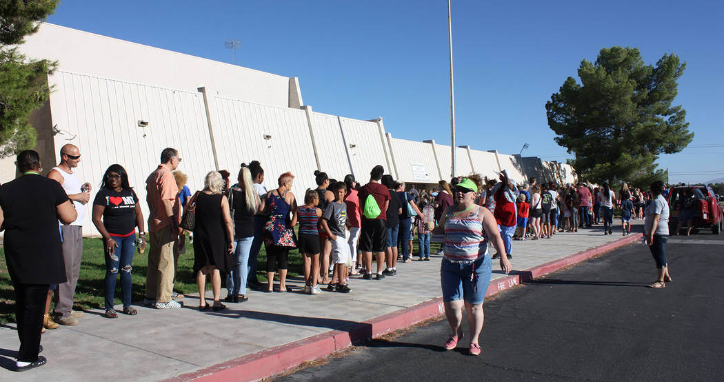 Robin Hebrock/Pahrump Valley Times A long line of Back to School Health Fair attendees is shown ...