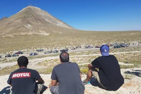 David Jacobs/Pahrump Valley Times Fans gather to watch as racers at the staging area of the sta ...