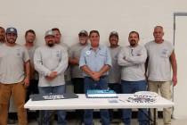 Special to the Pahrump Valley Times Matt Luis, fourth from right, stands for a group photo with ...