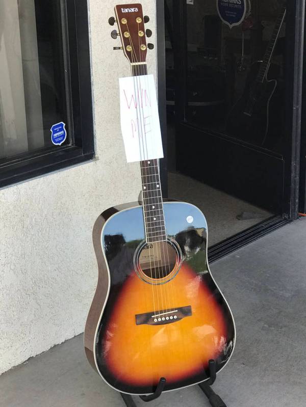 Jeffrey Meehan/Pahrump Valley Times Foxter Music raffled off an acoustic guitar in celebration ...