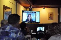 Horace Langford Jr./Pahrump Valley Times People watch Kamala Harris in a live telecast at K7 B ...