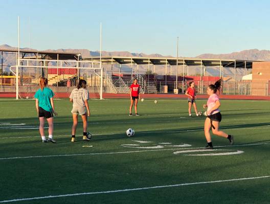 Tom Rysinski/Pahrump Valley Times Pahrump Valley High School girls soccer players at morning pr ...