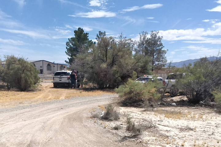Selwyn Harris/Pahrump Valley Times Nye County Sheriff's deputies prepare to transport suspect J ...