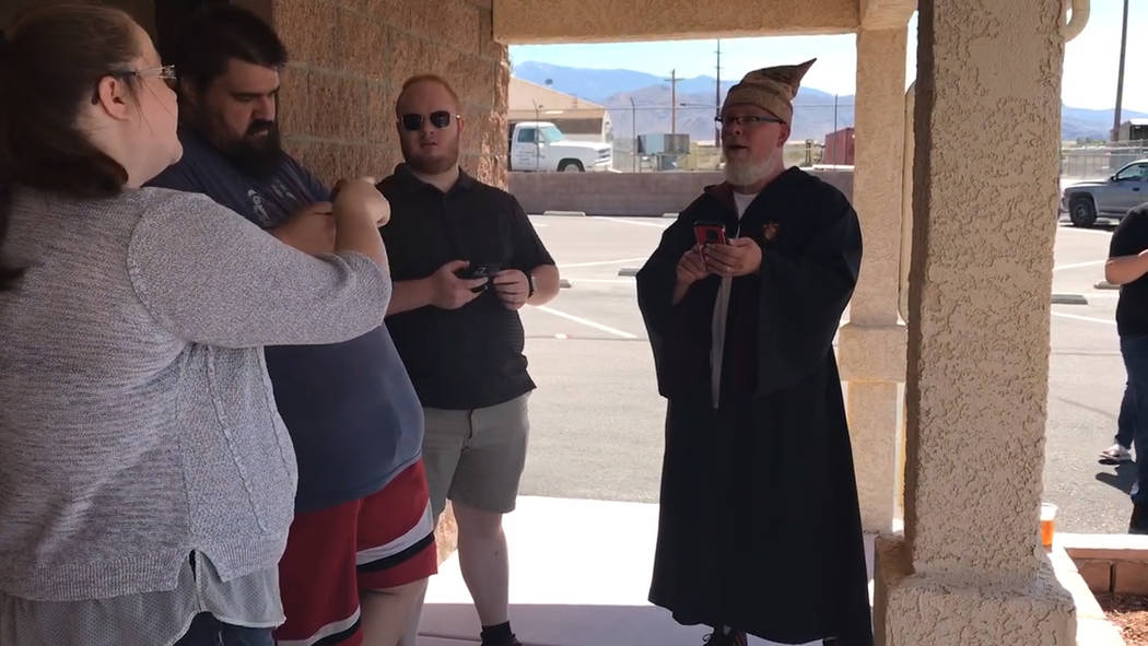 Jeffrey Meehan/Pahrump Valley Times George Chase (right) of Hypno Comics and Games in Pahrump s ...