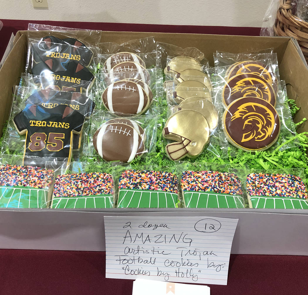 Tom Rysinski/Pahrump Valley Times A box of football-themed cookies was available at auction Sat ...