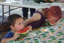 Robin Hebrock/Pahrump Valley Times Youngsters are pictured devouring cold watermelon during the ...