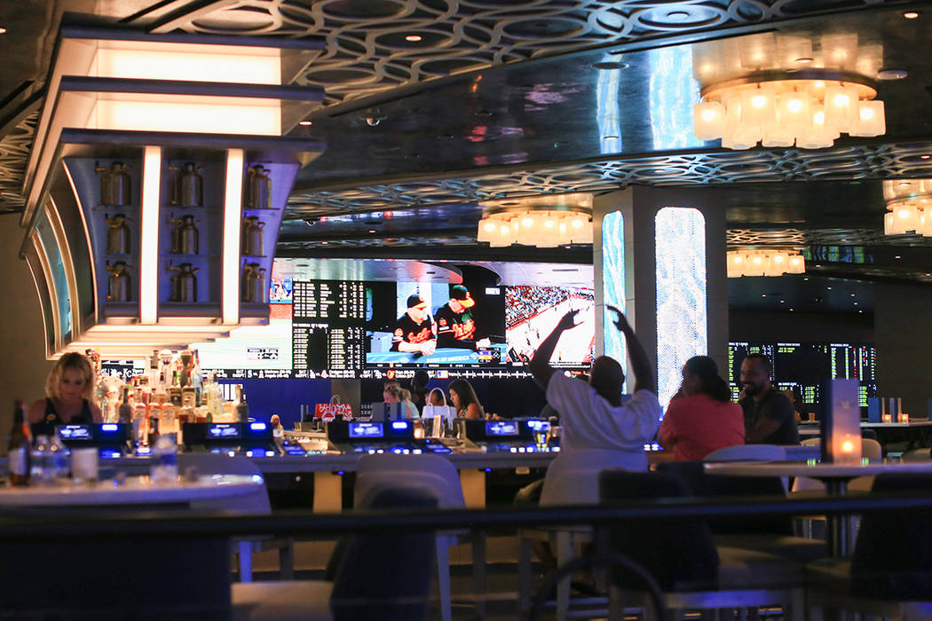 A newly renovated sports book can be seen from the a Taphouse bar at The STRAT hotel-casino in ...