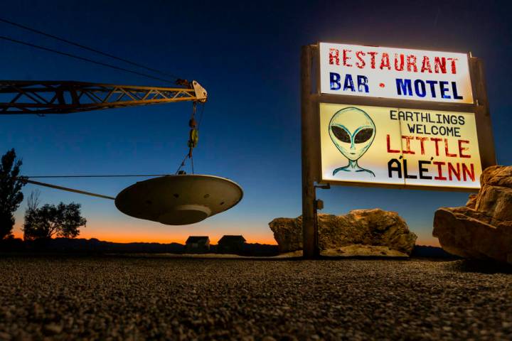 A spaceship hanging from a tow truck marks the entrance to the Little A'Le'Inn which is to be a ...