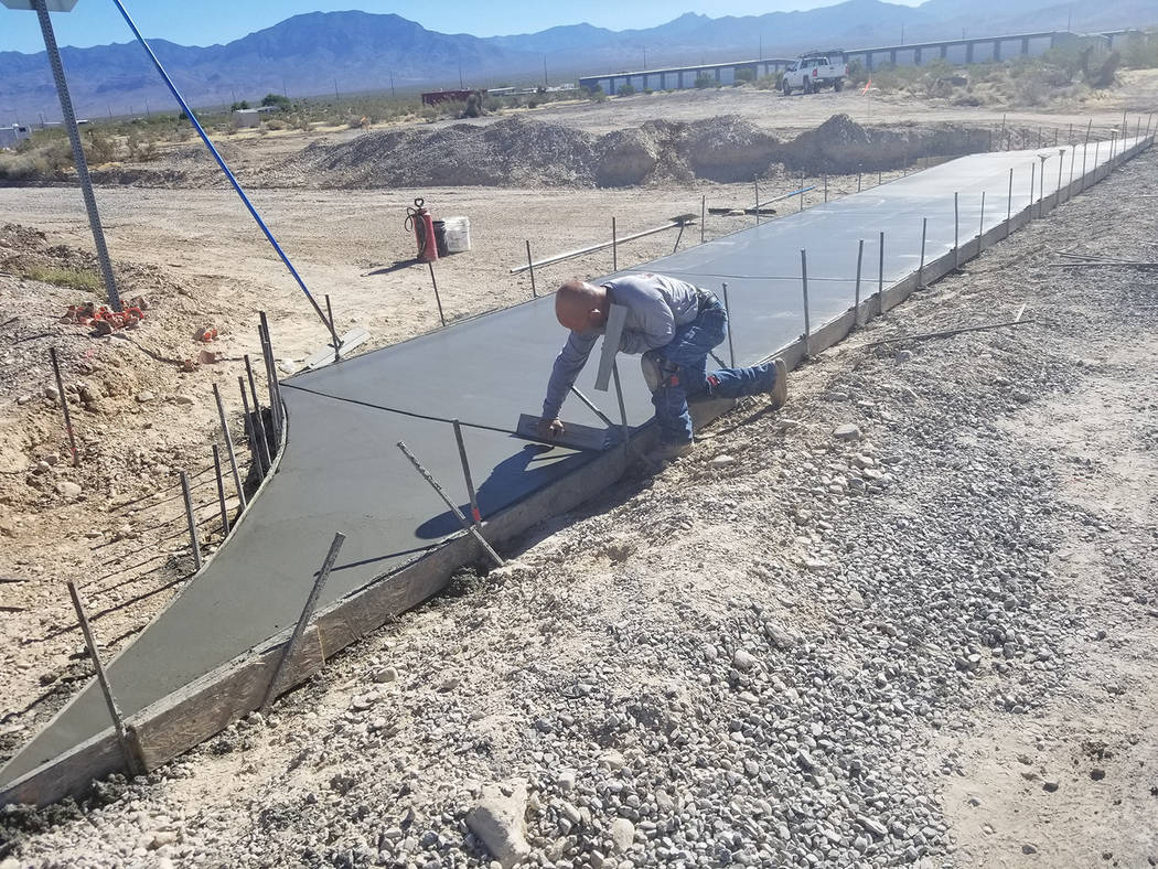 David Jacobs/Pahrump Valley Times A worker is shown in action earlier summer at a site off Basi ...