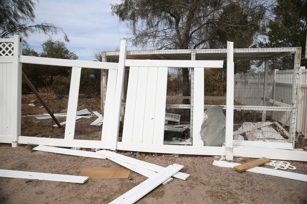 Broken fencing along the Northwest Academy property, owned by Marcel and Patricia Chappuis, the ...