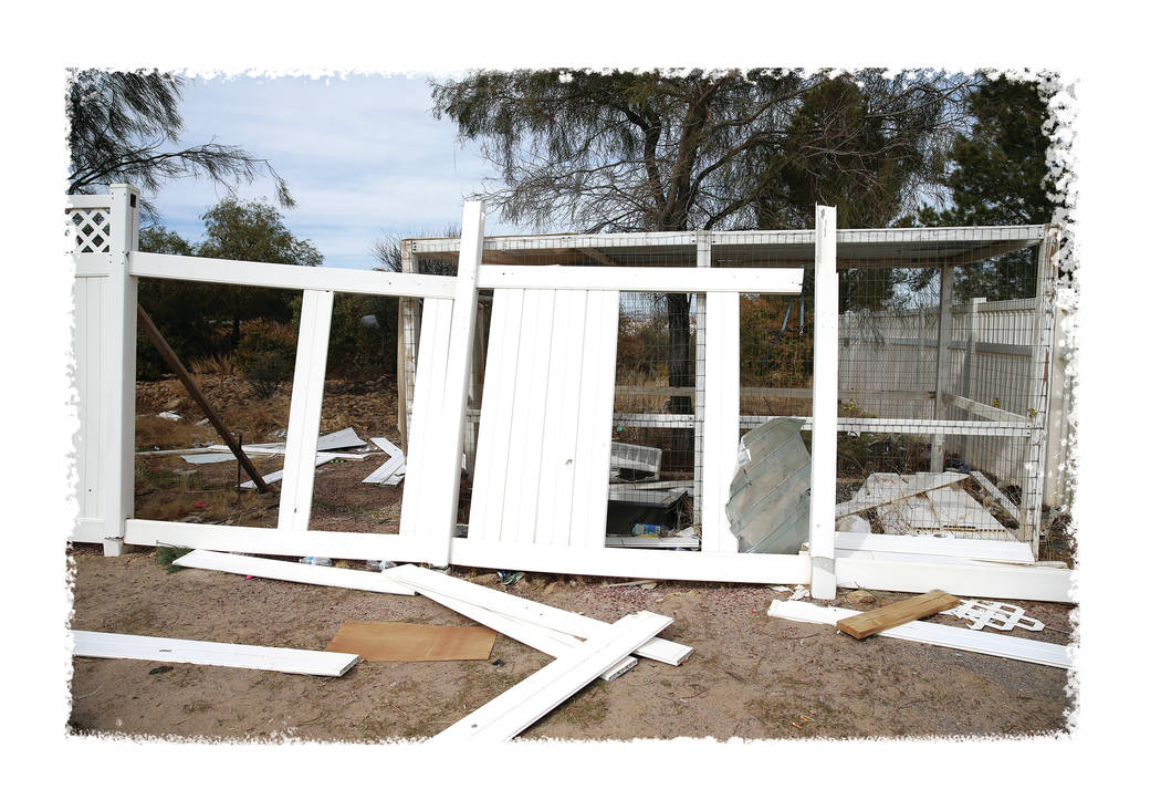 Broken fencing along the Northwest Academy property, owned by Marcel and Patricia Chappuis, the ...