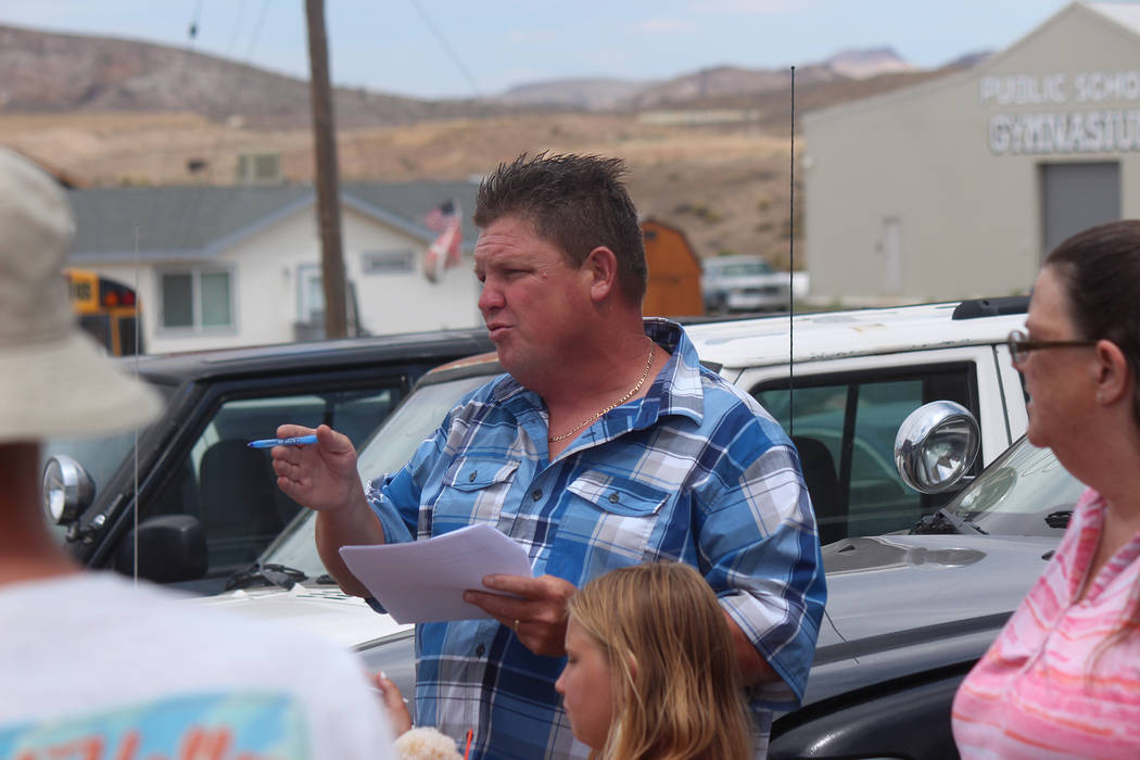 Jeffrey Meehan/Times-Bonnaza An auctioneer calls for bids on vehicles for the Esmeralda County ...