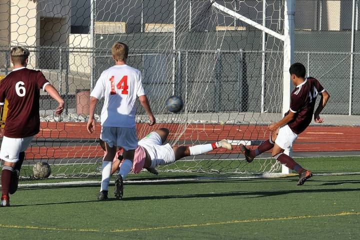 Horace Langford Jr./Pahrump Valley Times Senior Abraham Alvarez, right, scores the first goal o ...