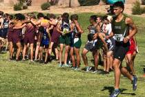 Tom Rysinski/Pahrump Valley Times Pahrump Valley High School cross country runners go into a pr ...