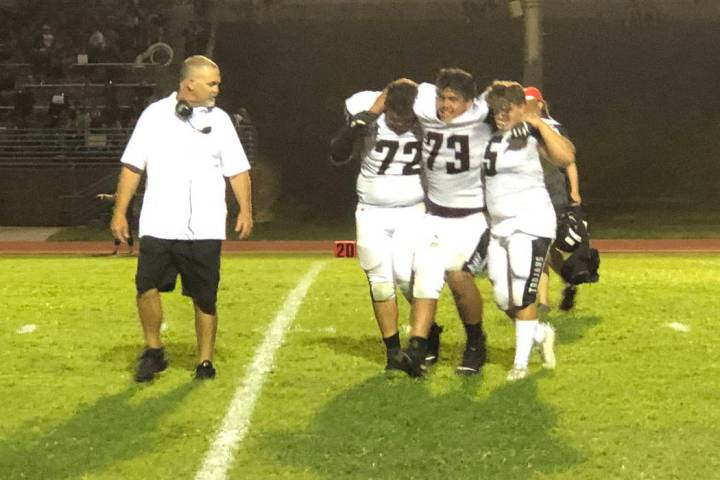 Tom Rysinski/Pahrump Valley Times Pahrump Valley coach Joe Clayton watches Caleb Sproul (72) an ...