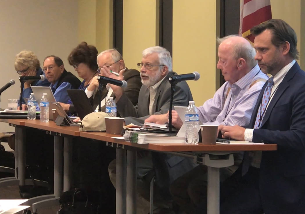 Jeffrey Meehan/Pahrump Valley Times Richard (Rick) Johnson sits (first from left) among board m ...