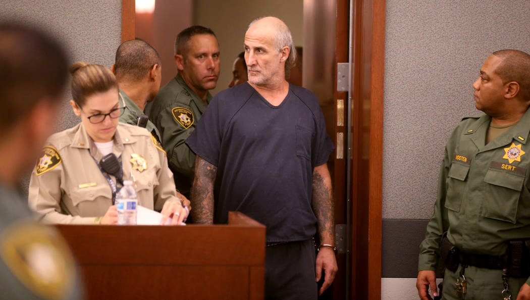 Michael "Sully" Sullivan looks back at the gallery while appearing in court at the Regional Jus ...