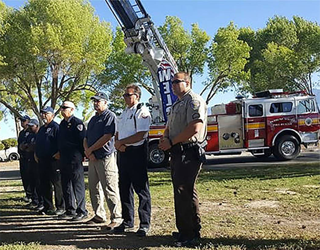 Horace Langford Jr./Pahrump Valley Times Local first responders stand before Pahrump Valley Fir ...