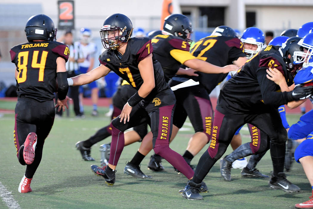 Peter Davis/Special to the Pahrump Valley Times Junior quarterback Dylan Wright hands off to ju ...