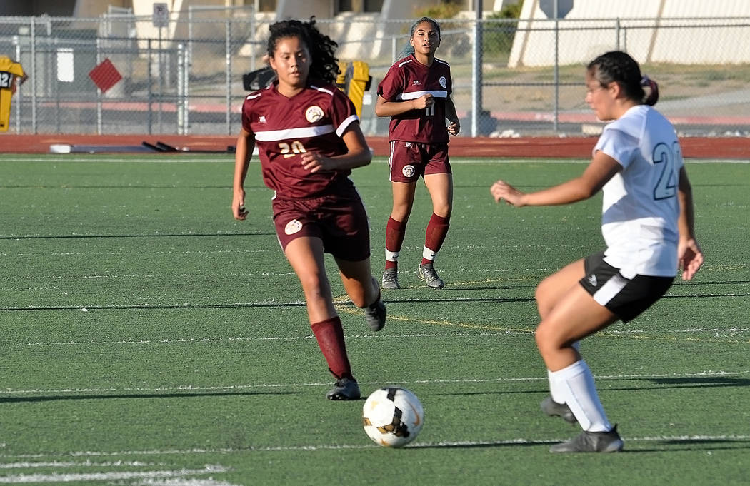 Horace Langford Jr./Pahrump Valley Times Pahrump Valley freshman Jessica Garcia moves in on a V ...
