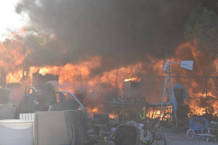 Special to the Pahrump Valley Times Pahrump fire crews were met with discharging ammunition, fi ...