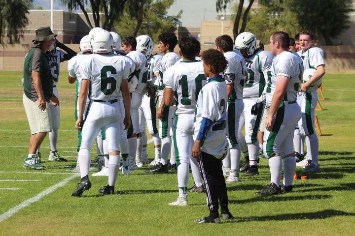 Tom Rysinski/Pahrump Valley Times Beatty football coach Leo Verzilli talks to his players befor ...