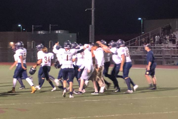 Tom Rysinski/Pahrump Valley Times Boulder City players celebrate stopping Pahrump Valley's atte ...