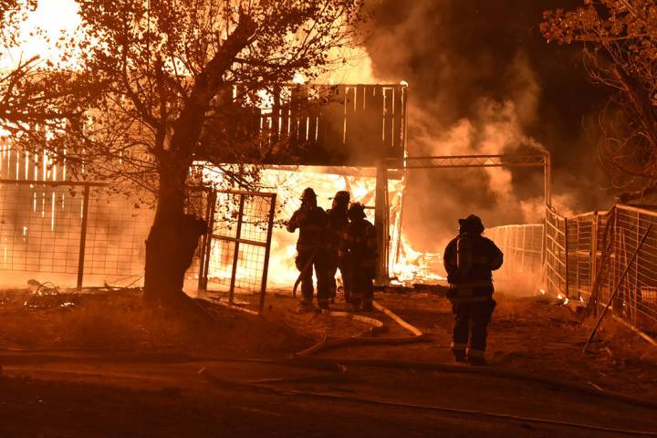 Special to the Pahrump Valley Times At least one firefighter who apparently suffered from heat ...