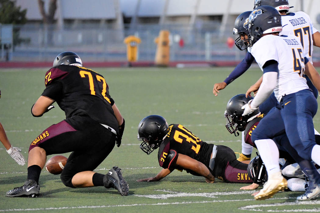Peter Davis/Special to the Pahrump Valley Times Caleb Sproul (72) and Fabian Soriano (30) react ...