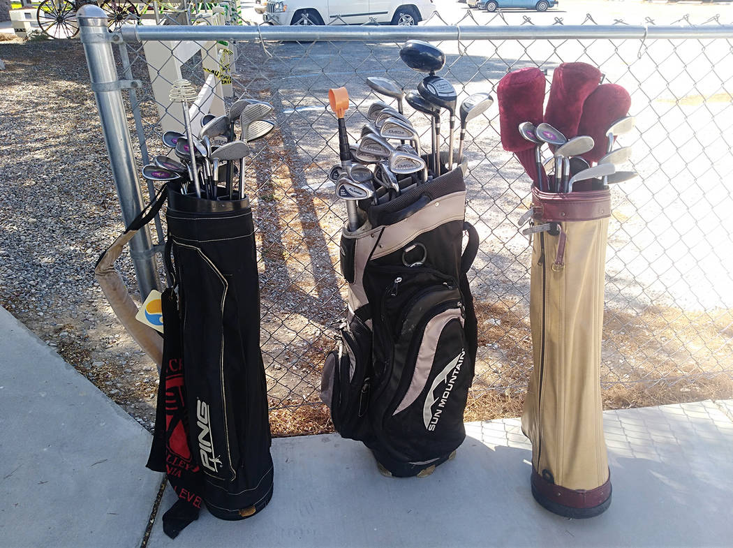 Selwyn Harris/Pahrump Valley Times Gently used golf clubs are one of the many items up for sale ...
