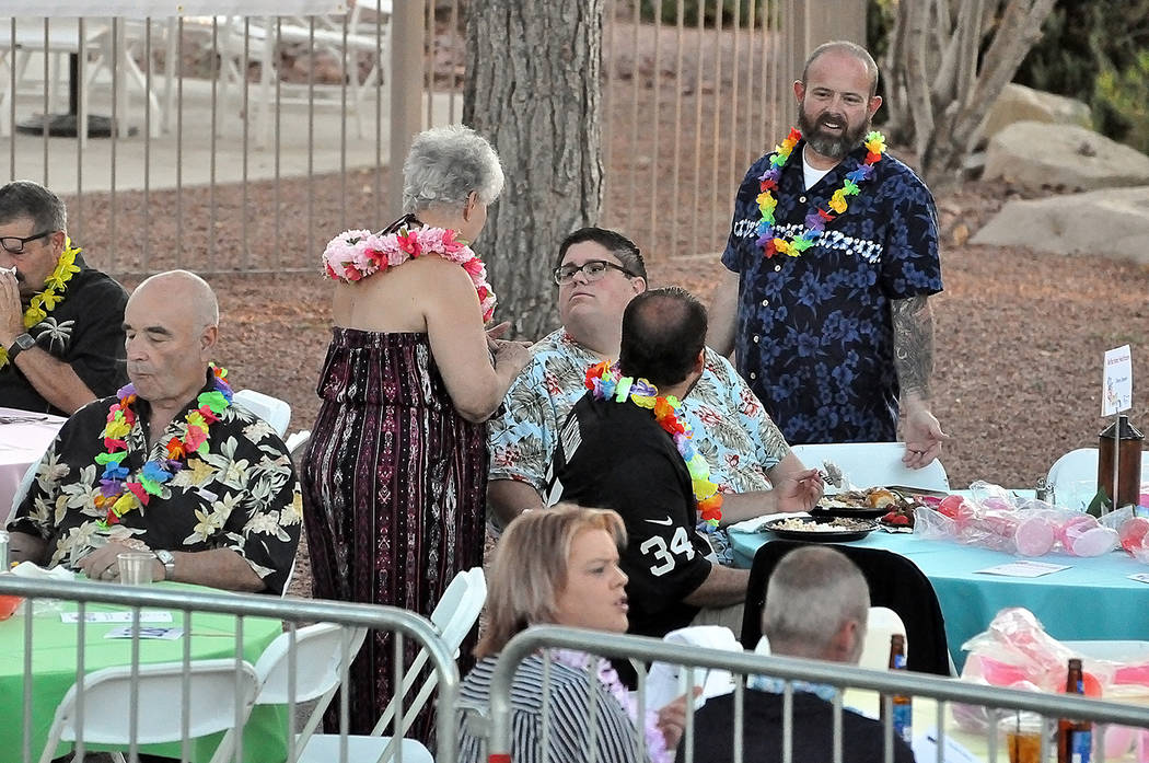 Horace Langford Jr./Pahrump Valley Times Guests at the 2019 CASA Luau are pictured sporting Ha ...