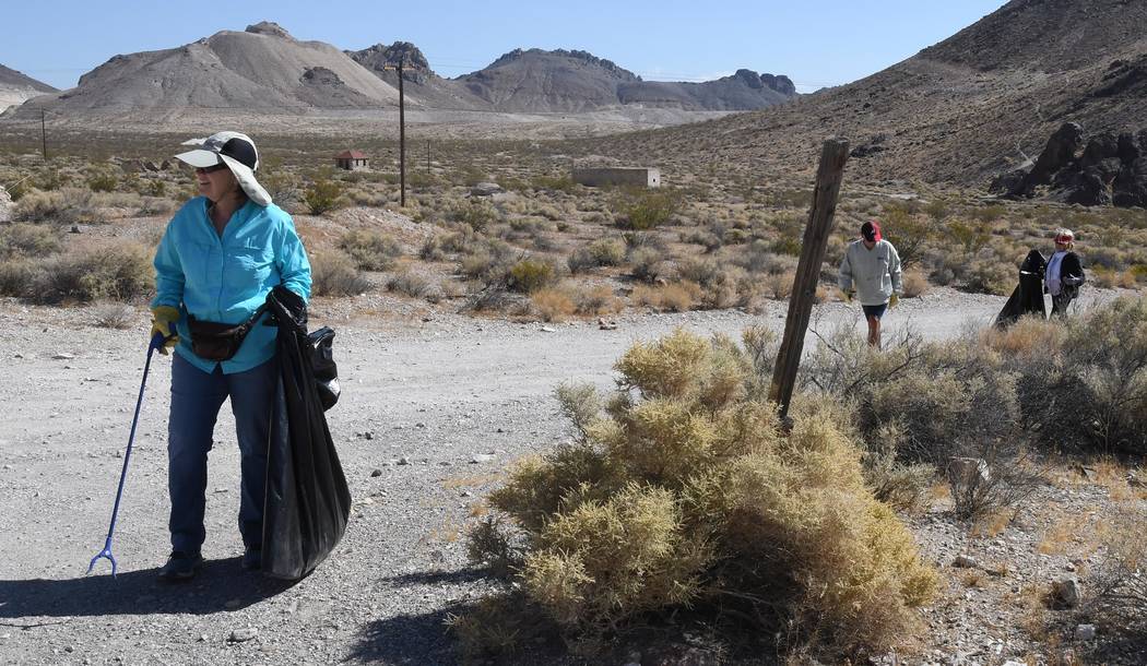 Richard Stephens/Special to the Pahrump Valley Times A volunteer scours the desert for litter i ...