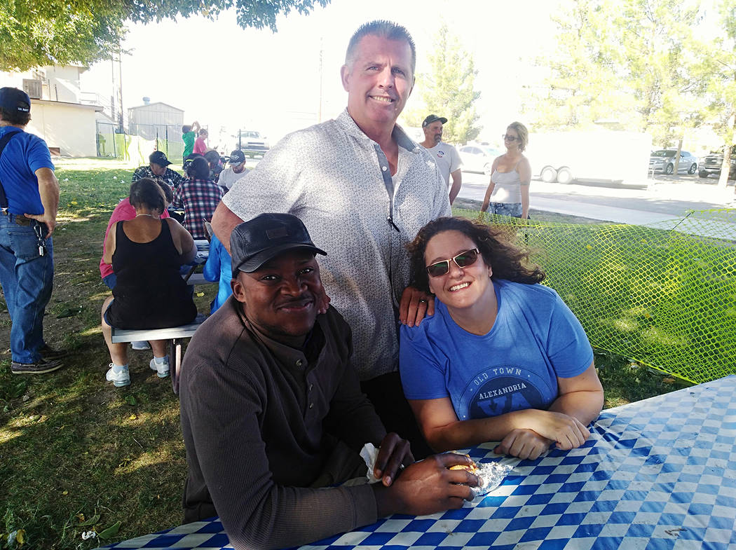 Selwyn Harris/Pahrump Valley Times Local resident Mbaya Mwamba (left), is enjoying lunch with ...