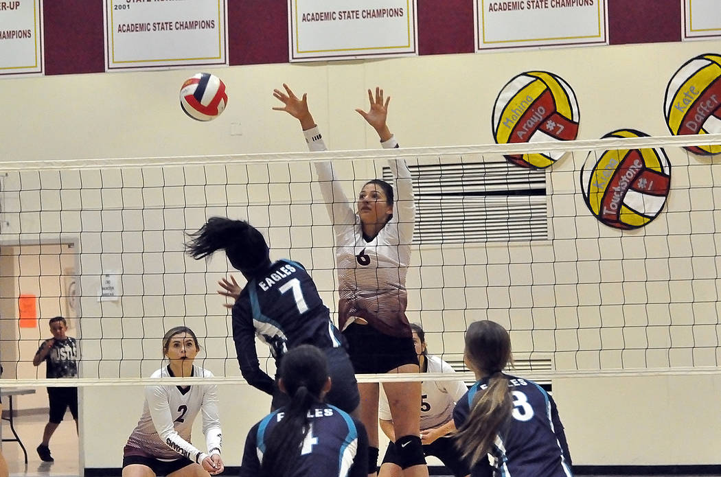 Horace Langford Jr./Pahrump Valley Times Junior Nicky Velazquez blocks an attack by Sky Pointe ...