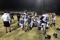 Tom Rysinski/Pahrump Valley Times Pahrump Valley High School football players gather in the end ...