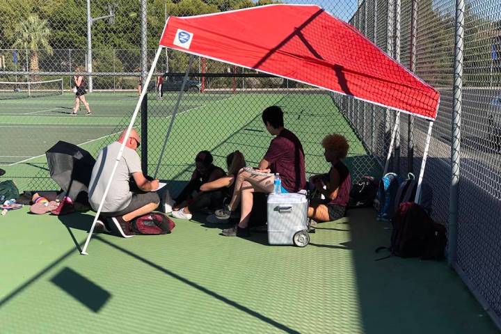 Tom Rysinski/Pahrump Valley Times Pahrump Valley tennis coach Dan Clift goes over court assignm ...