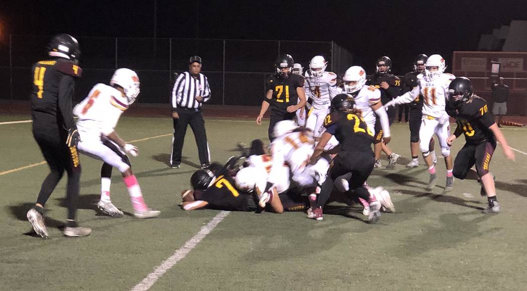 Tom Rysinski/Pahrump Valley Times Pahrump Valley junior Dylan Wright (7) finds the end zone for ...