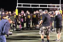 Tom Rysinski/Pahrump Valley Times Pahrump Valley High School football players gather in the end ...