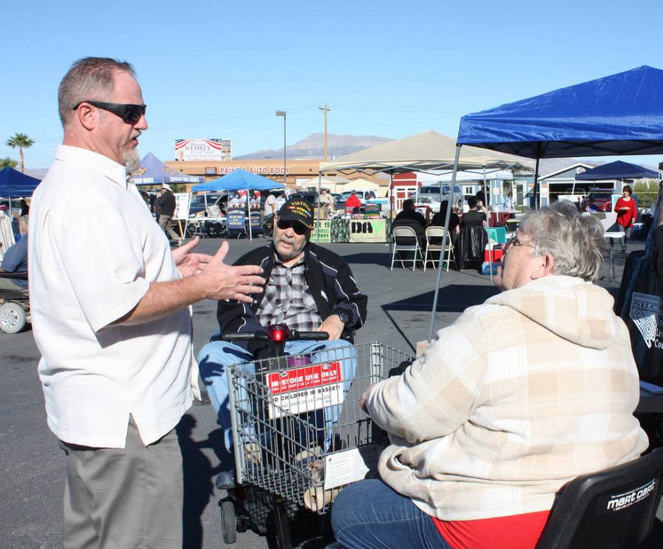Robin Hebrock/Pahrump Valley Times Veterans Stand Down organizer Linda Wright, at right, is sho ...